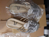 Silver ladies shoes pumps by designer Vinny Jorden