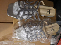 Silver ladies shoes pumps by designer Vinny Jorden