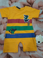 Baby romper in yellow color printed