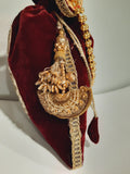Red clutch for weddings and parties with golden chain