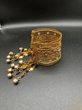 Arabic style Golden Cuff bracelet wide with jadao stones with bells and tassels ringing