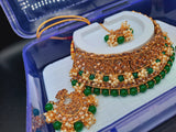 Bridal Jewelry in Golden base with green and off white stones combination